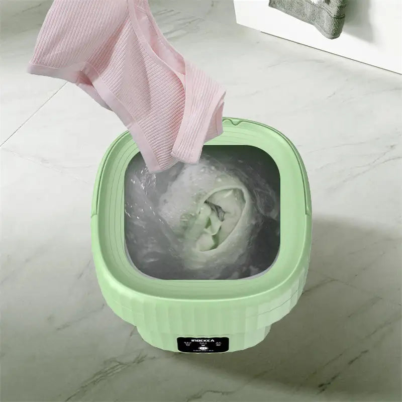 Example of green Portable Mini Washing Machine in use